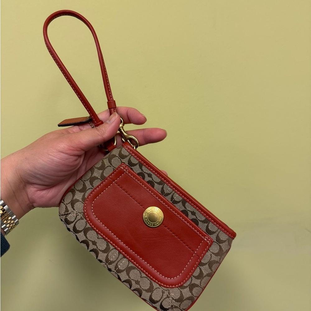 Coach Signature Burnt Orange and Tan Wristlet